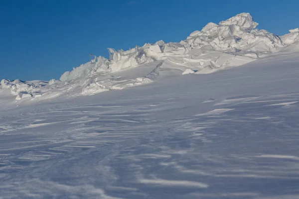 Snow-covered ice hummocks of Lake Baikal — Stock Photo, Image