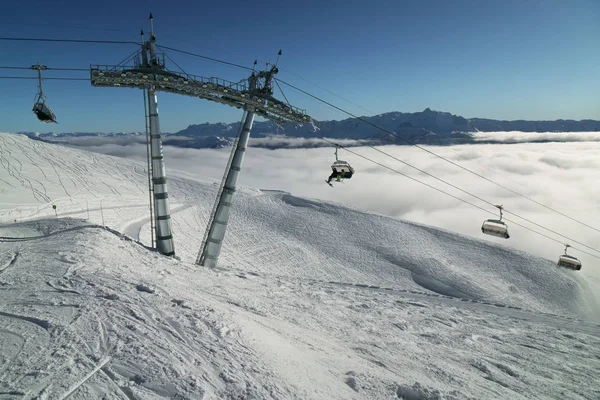 Chairlift for 4 persons on Southern slope of Rosa Peak 2320 meters above sea level — Stock Photo, Image