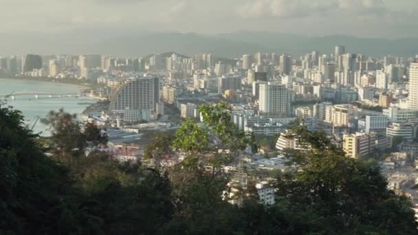 Evening panorama of Sanya from the top of a hill in a Luhuitou Park stock footage video — Stock Video