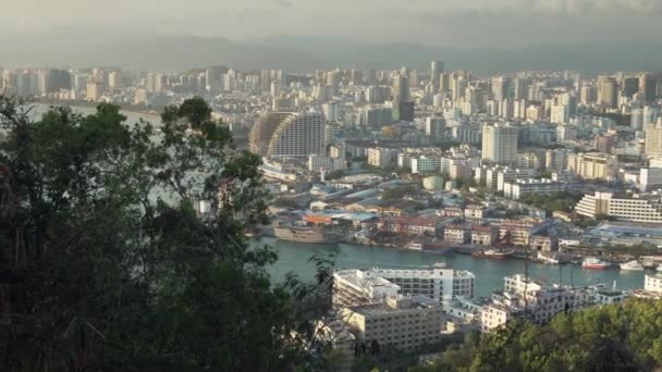 Evening panorama of Sanya from the top of a hill in a Luhuitou Park stock footage video — Stock Video