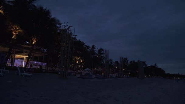 Night beach Chaweng Noi with hotels and restaurants time lapse stock footage video — Stock Video