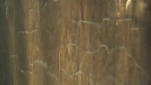 Artificial waterfall on the background of stone wall stock footage video — Stock Video