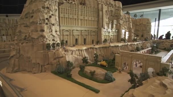 Exhibition of mock-ups Petra made of Lego pieces in Miniland Legoland at Dubai Parks and Resorts stock footage video — Stock Video