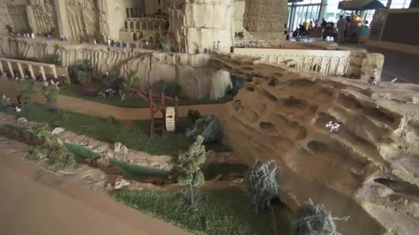 Exhibition of mock-ups Petra made of Lego pieces in Miniland Legoland at Dubai Parks and Resorts stock footage video — Stock Video