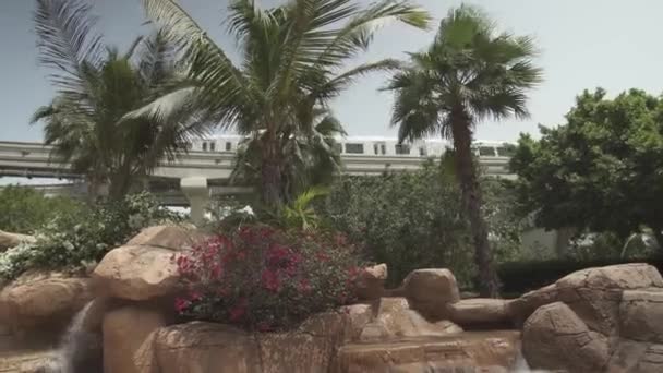 Waterfall at the entrance to the aquapark Aquaventure in Dubai stock footage video — Stock Video