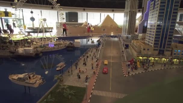 Exhibition of mock-ups Dubai Marina made of Lego pieces in Miniland Legoland at Dubai Parks and Resorts stock footage video — Stock Video