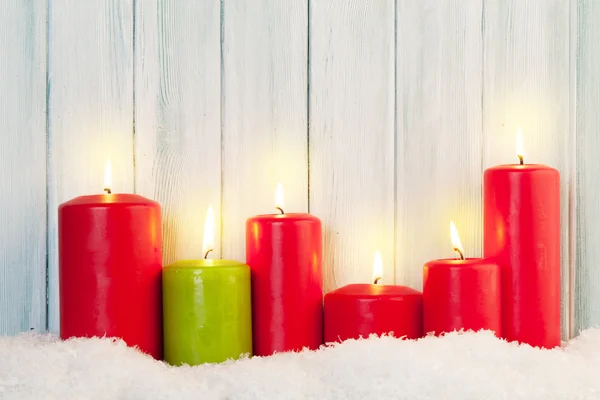 Christmas candles in snow — Φωτογραφία Αρχείου