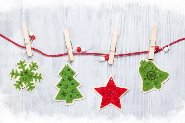 Christmas decor hanging on clothesline — Stockfoto