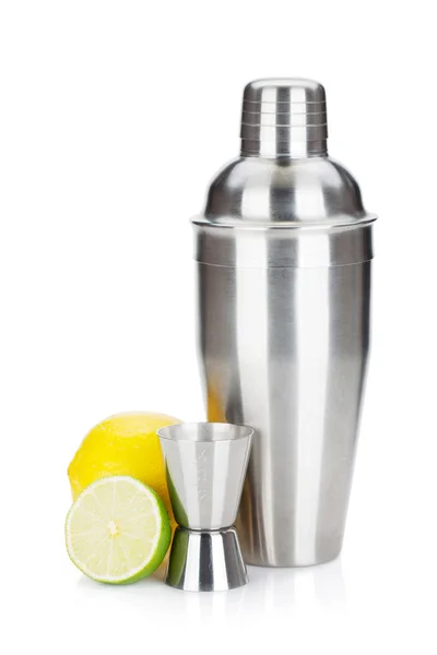 Cocktail shaker with measuring cup and citruses — Stock Photo, Image