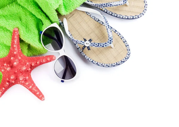 Flip flops, zonnebril en zeester — Stockfoto