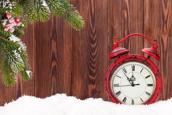 Christmas fir tree and red alarm clock — Stock Photo, Image