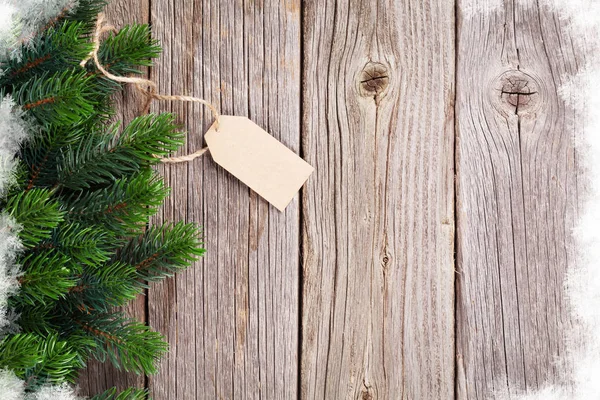 Kerst houten achtergrond met dennenboom — Stockfoto