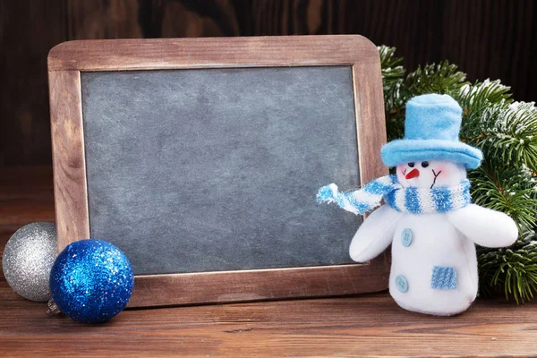 Christmas chalkboard, snowman and fir tree — Stock Photo, Image