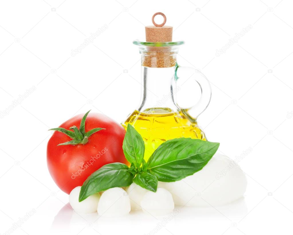 Mozzarella cheese, olive oil, tomato and basil Stock Photo by ©karandaev 130050378