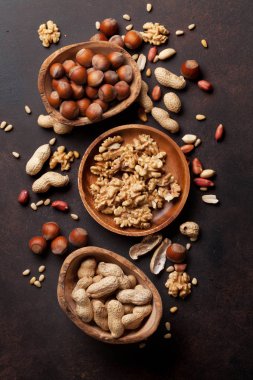 Various nuts in bowls clipart