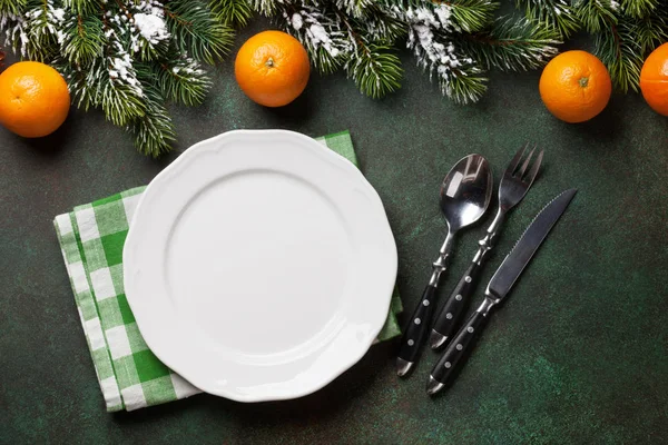 Prato de jantar de Natal, talheres e laranjas — Fotografia de Stock