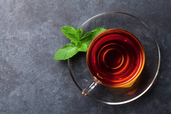 Tea cup with mint on table — Stock Photo, Image