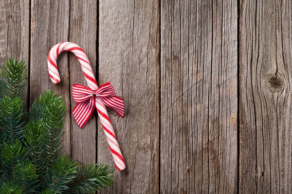 Caña de caramelo de Navidad y abeto —  Fotos de Stock