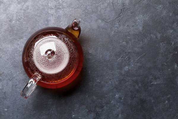 Teapot on stone table