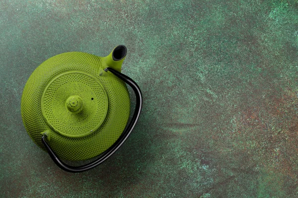 Green tea pot on table — Stock Photo, Image