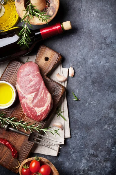 Raw beef steak cooking — Stock Photo, Image