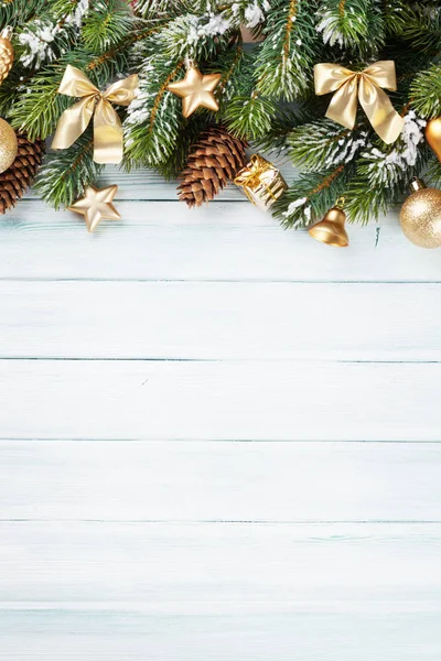 Snowy fir tree and decoration — Stock Photo, Image