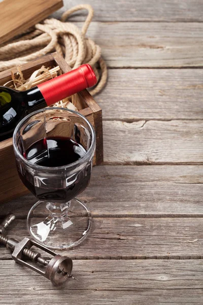 Red wine bottle and glass — Stock Photo, Image