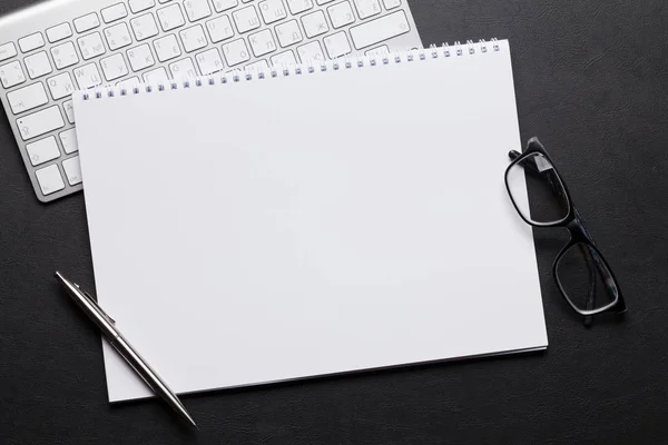 Office table with pc, notepad and glasses — Stock Photo, Image