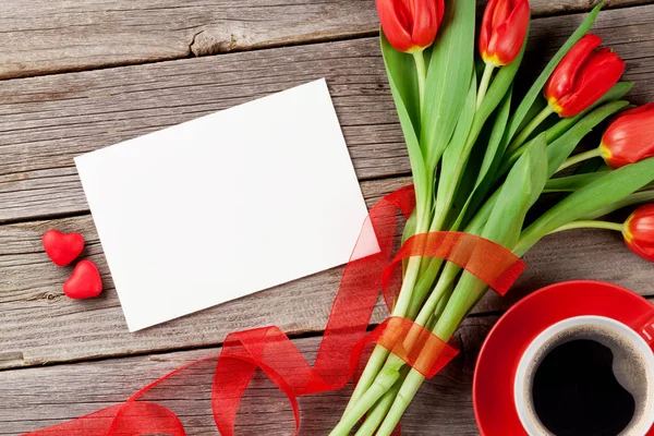 Tulips, greeting card and candy hearts — Stock Photo, Image