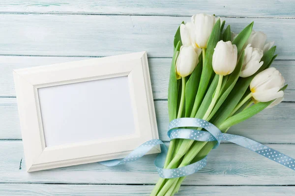 White tulips and photo frame — Stock Photo, Image