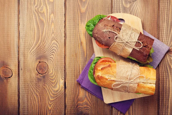 Two sandwiches with salad, ham, cheese — Stock Photo, Image