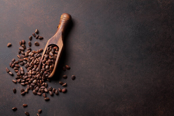 Pine nuts on stone table