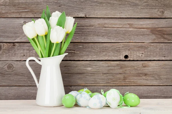 Easter eggs and tulips — Stock Photo, Image