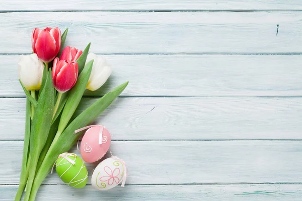 Easter eggs and tulips bouquet — Stock Photo, Image