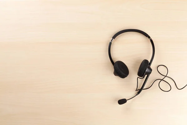 Office desk with headset — Stock Photo, Image