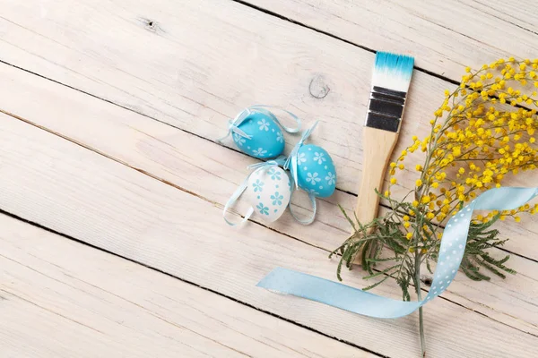 Easter eggs and brush — Stock Photo, Image