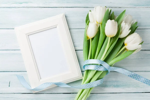White tulips and photo frame — Stock Photo, Image