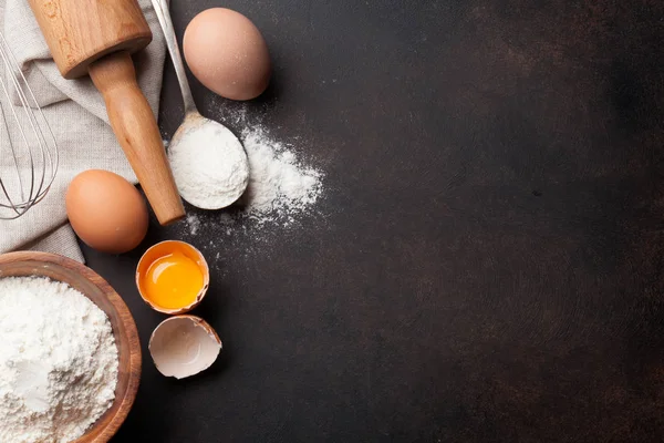 Flour, eggs and rolling-pin — Stock Photo, Image