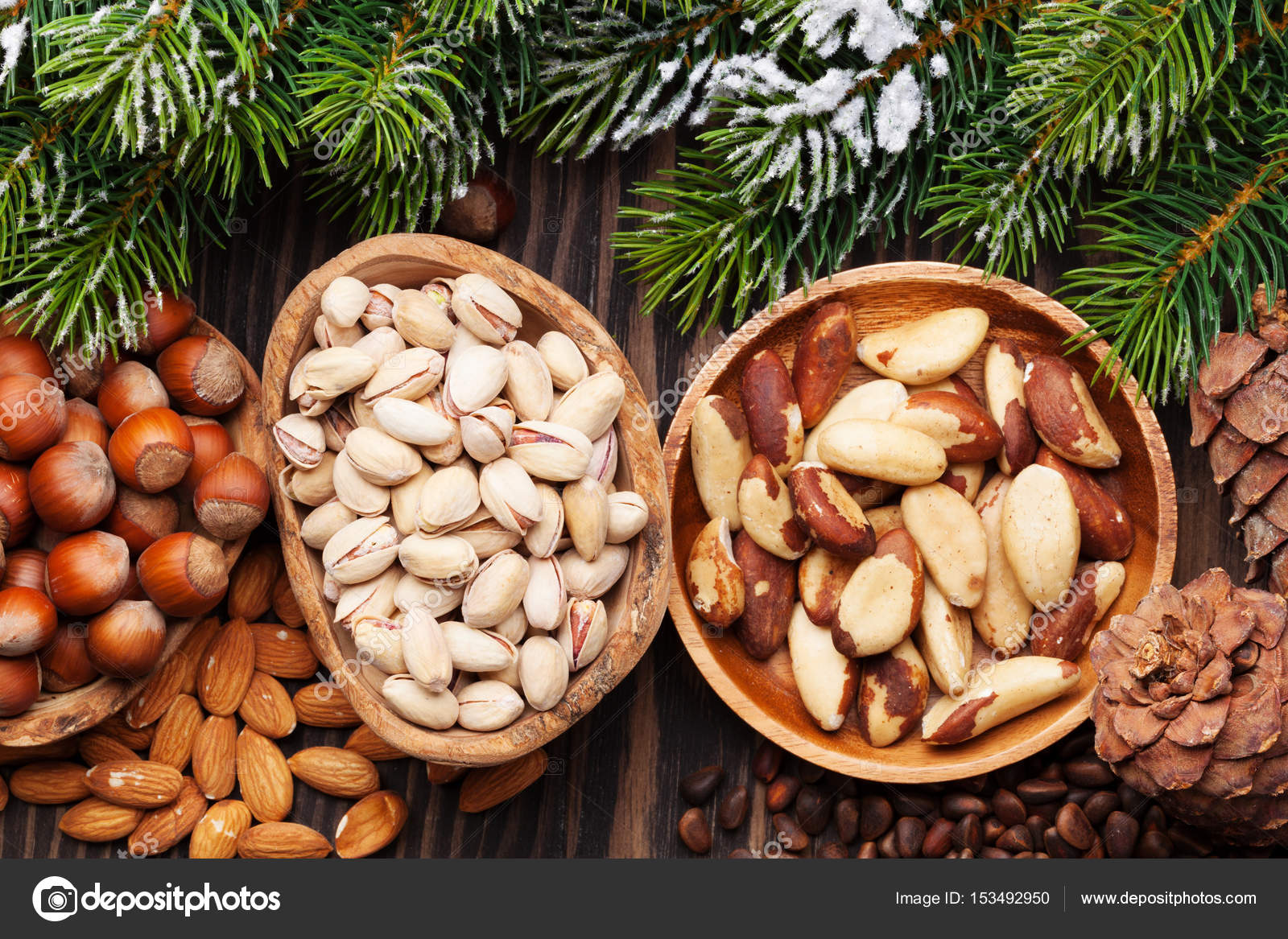Various nuts in bowls — Stock Photo © karandaev 153492950