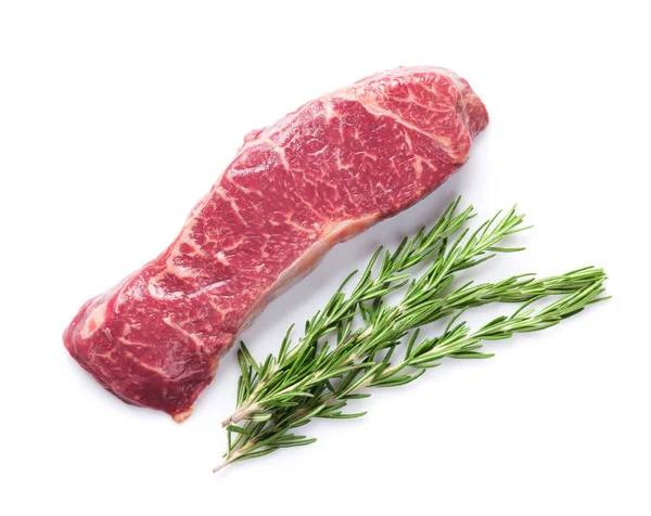 Raw striploin steak with rosemary — Stock Photo, Image