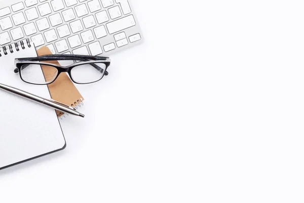 Keyboard, notebooks and eyeglasses — Stock Photo, Image