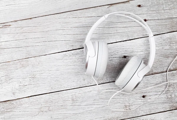 Λευκά ακουστικά σε πίνακα — Φωτογραφία Αρχείου