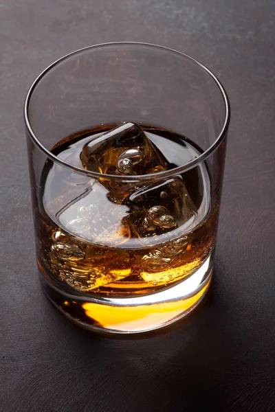 Glass of whiskey with ice — Stock Photo, Image