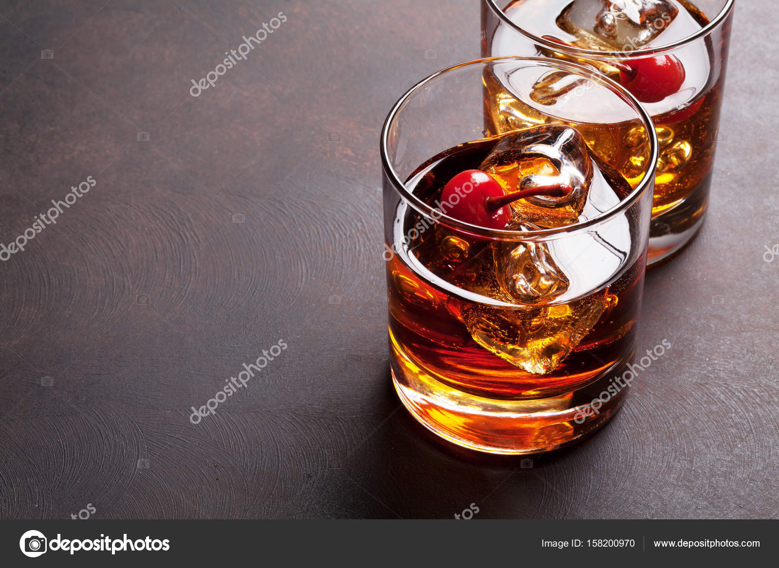 https://st3.depositphotos.com/1001069/15820/i/1600/depositphotos_158200970-stock-photo-manhattan-cocktail-glasses.jpg