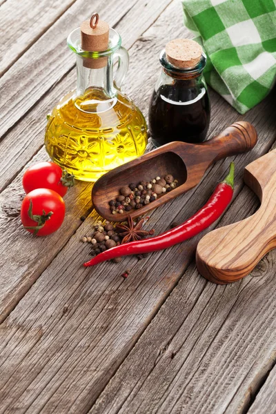 Spices, condiments and tomatoes — Stock Photo, Image