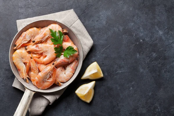 Fresh seafood on stone table. Shrimps — Stock Photo, Image