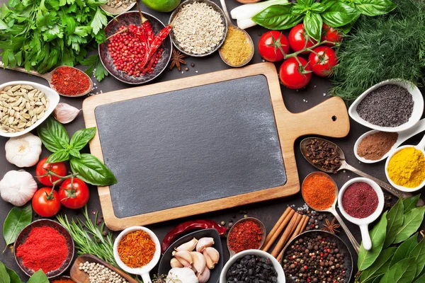 Spices and herbs in bowls — Stock Photo, Image