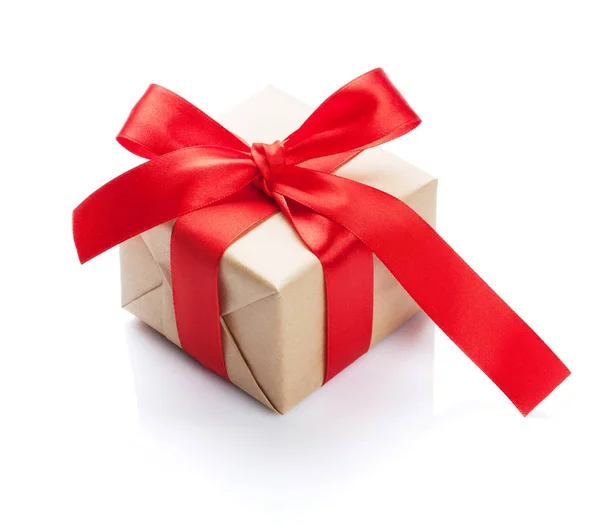 Caixa de presente com arco vermelho — Fotografia de Stock