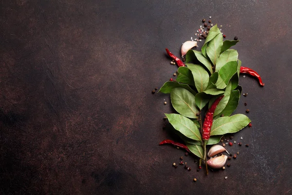 Herbs and spices on table — Stock Photo, Image