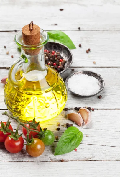 Basil and spices on wooden table — Stock Photo, Image